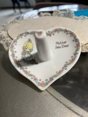 Heart-Shaped Ceramic Ring Dish with Sewing Girl Motif. Precious Moments